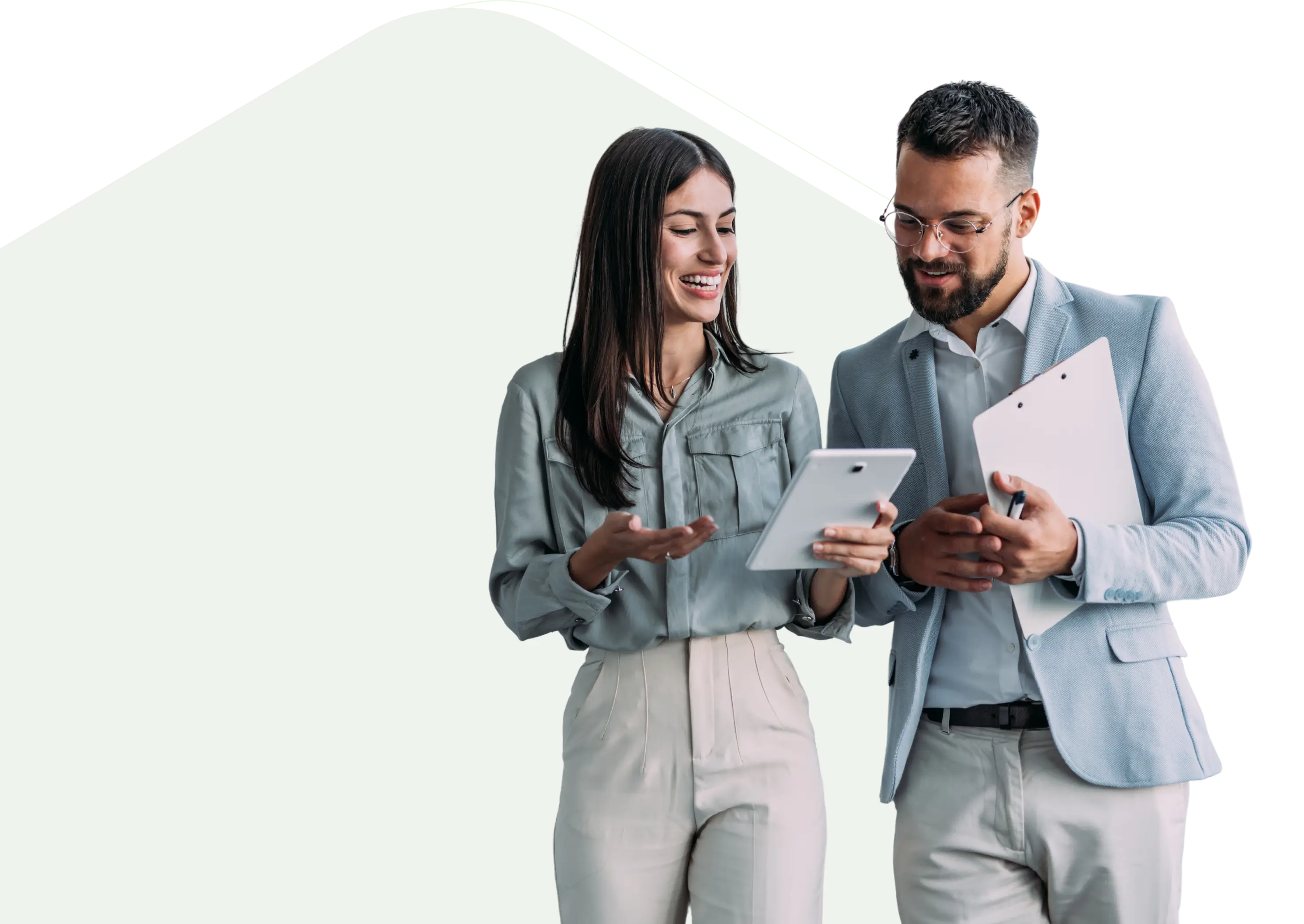 Business colleagues reviewing tablet and clipboard